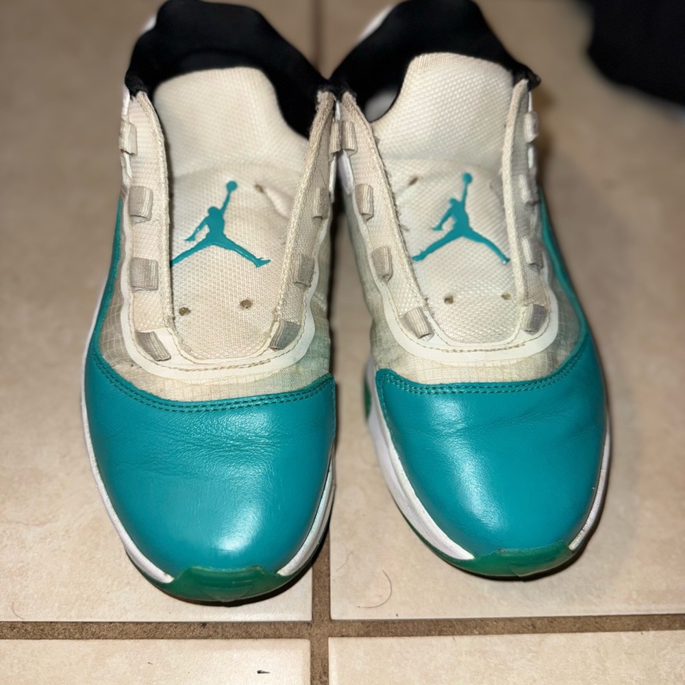 Jordan low teals size 7 Kids Teal and White Sneakers no laces or soles